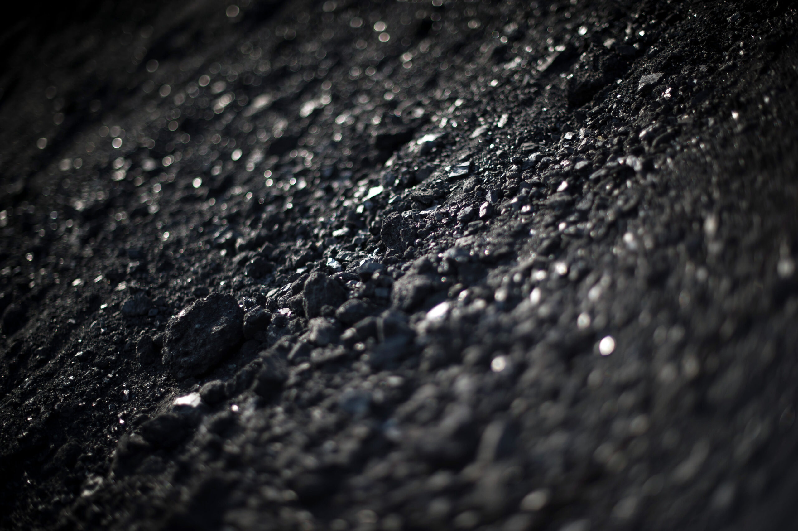 Closeup,Of,A,Pile,Of,Black,Coal,In,An,Open-pit